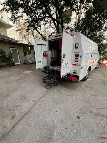 Magnet Plumbing service vehicle on-site for Grease Trap Cleaning in Montecito